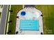Overhead shot of a community pool with a variety of water features and lounging areas at 184 Tetcott St, Mooresville, NC 28115