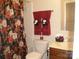 Cozy bathroom featuring a floral shower curtain at 1960 Aston Mill Pl, Charlotte, NC 28273