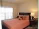 Cozy bedroom featuring a comfortable bed with decorative pillows and side tables at 1960 Aston Mill Pl, Charlotte, NC 28273