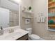 This bathroom features a modern vanity, toilet, and tiled shower with glass door at 2002 Thurston Dr, Indian Trail, NC 28079