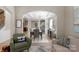 Elegant dining room with stylish lighting, hardwood floors, and comfortable seating, perfect for gatherings at 2002 Thurston Dr, Indian Trail, NC 28079