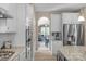 Kitchen with stainless appliances opening into dining area at 2002 Thurston Dr, Indian Trail, NC 28079