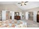 Bright main bedroom featuring a vaulted ceiling, a walk-in closet, and ensuite bathroom access at 2002 Thurston Dr, Indian Trail, NC 28079