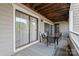 Inviting outdoor balcony with seating, a patterned rug, wooden floors, and sliding glass doors at 212 W 10Th St # 17, Charlotte, NC 28202