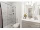 Bright bathroom featuring a marble shower, modern vanity, and updated fixtures at 212 W 10Th St # 17, Charlotte, NC 28202