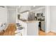 Kitchen with stainless steel appliances, granite countertops, and breakfast bar seating at 212 W 10Th St # 17, Charlotte, NC 28202