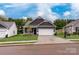 Charming single-Gathering home featuring a two-car garage and manicured lawn at 2219 Catawba Trace Dr, Catawba, NC 28609