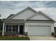Charming single-story home with white siding, stone accents, and an attached two-car garage at 2219 Catawba Trace Dr, Catawba, NC 28609