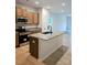 Modern kitchen with stainless steel appliances, granite countertops, and a kitchen island at 2219 Catawba Trace Dr, Catawba, NC 28609