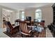 Spacious living room featuring modern windows, comfortable seating, and great lighting at 237 Walnut Point Dr, Matthews, NC 28105