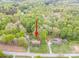 Expansive aerial view of home nestled amidst lush greenery and mature trees at 2582 Ivey Church Rd, Lincolnton, NC 28092