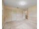 This carpeted bedroom has wallpaper, a large closet, and an access door at 2582 Ivey Church Rd, Lincolnton, NC 28092