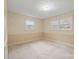 The light-filled bedroom has wallpaper and ample natural light from multiple windows at 2582 Ivey Church Rd, Lincolnton, NC 28092