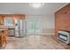 Kitchen with stainless steel appliances, wood cabinets, and a view of screened porch at 2582 Ivey Church Rd, Lincolnton, NC 28092