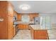 Well-appointed kitchen featuring wood cabinets, granite countertops, and stainless steel appliances at 2582 Ivey Church Rd, Lincolnton, NC 28092