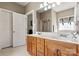 Bathroom featuring a double sink vanity, shower with glass doors and neutral color palette at 2610 Flagstone Ct, Shelby, NC 28152