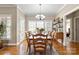 Charming dining room with ample natural light, wood floors, and traditional decor at 2610 Flagstone Ct, Shelby, NC 28152
