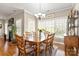 Bright dining room with large windows, hardwood floors, and a classic chandelier at 2610 Flagstone Ct, Shelby, NC 28152