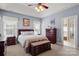 Tranquil main bedroom with soft lighting, a large window, and an ensuite bathroom at 2610 Flagstone Ct, Shelby, NC 28152