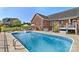 Inviting backyard pool with a spacious patio area, perfect for entertaining and relaxation at 2610 Flagstone Ct, Shelby, NC 28152