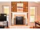 Living room fireplace with white mantle and decorative vases at 2929 Matoka Trl, Matthews, NC 28104