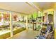 Charming covered front porch featuring comfortable seating and view of landscaped yard with mature trees at 2929 Matoka Trl, Matthews, NC 28104