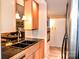 A charming kitchen space with wood cabinets, recessed lighting, and stainless steel appliances at 2929 Matoka Trl, Matthews, NC 28104