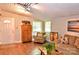 Comfortable living room with cozy seating, hardwood floors, and natural light at 2929 Matoka Trl, Matthews, NC 28104