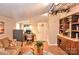 Inviting living room with a comfortable seating area and a functional built-in desk at 2929 Matoka Trl, Matthews, NC 28104