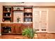Custom cabinet featuring spacious countertop space and storage areas in the living room at 2929 Matoka Trl, Matthews, NC 28104