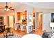 The living space has hardwood floors, a kitchen bar, and a seamless flow to the dining room at 2929 Matoka Trl, Matthews, NC 28104