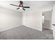 Bright bedroom featuring neutral walls, trim, and plush gray carpet at 3012 Isle Ln, Monroe, NC 28110