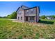 Lovely home showcasing a modern exterior design, neat front yard, and inviting appeal at 3012 Isle Ln, Monroe, NC 28110