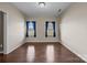 A versatile room with hardwood flooring, ready for customization and personal touches at 303 Landis Oak Way, Landis, NC 28088