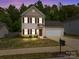 Charming two-story home features manicured lawn at 303 Landis Oak Way, Landis, NC 28088