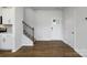 Bright foyer featuring wood flooring, a staircase, and a welcoming entryway at 3056 Ora Smith Rd, Lincolnton, NC 28092
