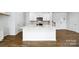Well-appointed kitchen with white cabinetry, stainless steel appliances, and a central island at 3056 Ora Smith Rd, Lincolnton, NC 28092