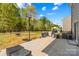 Outdoor patio with a grill, basketball hoop, and seating area, perfect for entertaining at 320 Silver Oak Cir, Rockwell, NC 28138