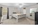 Bright bedroom with large window, neutral walls, and comfortable carpet at 320 Silver Oak Cir, Rockwell, NC 28138