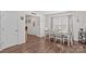 Dining room with seating for four, with wood-look flooring at 320 Silver Oak Cir, Rockwell, NC 28138