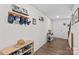 Inviting entryway with hardwood floors, coat rack, and bright natural light at 320 Silver Oak Cir, Rockwell, NC 28138