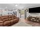 Bright and open-concept living room seamlessly connecting to a modern kitchen at 320 Silver Oak Cir, Rockwell, NC 28138