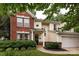 Charming two-story home featuring a blend of brick and siding, complemented by manicured landscaping at 3404 Pasture View Ct, Charlotte, NC 28269