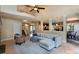 Inviting living room with high ceilings, natural light, and an open layout to the kitchen and dining area at 3404 Pasture View Ct, Charlotte, NC 28269
