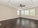 The bedroom boasts natural light, a ceiling fan, and a neutral color scheme at 358 Hampton Trail Dr, Fort Mill, SC 29708