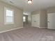 Bedroom featuring neutral carpet, natural light and a double door closet at 358 Hampton Trail Dr, Fort Mill, SC 29708
