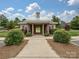 Community clubhouse featuring covered area with landscaping and sidewalks, perfect for gatherings at 358 Hampton Trail Dr, Fort Mill, SC 29708