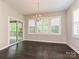 Dining room with slider access to deck and plantation shutters at 358 Hampton Trail Dr, Fort Mill, SC 29708