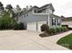 Stately home with 3-car garage, manicured landscaping, and long driveway at 358 Hampton Trail Dr, Fort Mill, SC 29708