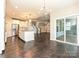 Open-concept living area features a kitchen, living room and staircase at 358 Hampton Trail Dr, Fort Mill, SC 29708